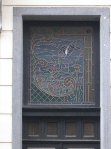 Loncinstraat 20, impostvenster met glas-in-lood, 1903, arch. Henri Martyn, 2005