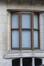 Louizalaan 346, huis Max Hallet. Groot venster met stijlen met keellijstprofiel en lichtjes trapezoïdaal raamwerk, 2007