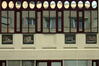 Louizalaan 413, keramische panelen met diverse gebouwen die elkaar op dit pand opvolgden, 2006