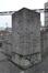 Quai des Charbonnages, pont de la Porte de Flandre, enjambant le canal assurant le liaison entre la chaussée de Gand et la rue Antoine Dansaert. Postament sculpté sur le territoire de Bruxelles Ville, 2016