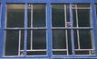 Maurice Liétartstraat 56-58, glas-in-lood in T-vormig venster op benedenverdieping, 2002