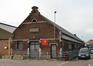 Ropsy Chaudronstraat 24, Het Slachthuis en de Markten van Anderlecht-Kuregem, oude eerste slachthuis van het linkerblok, zuidoostelijke gevel, (© ARCHistory, 2019)