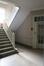 Place Georges Brugmann 30. Hall avec escalier et ascenseur  © Homegrade, 2022