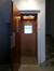 Rue Mercelis 58. Ascenseur au rez-de-chaussée avec porte palière ouverte © Homegrade , 2022