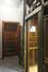 Rue Alfred Cluysenaer 13. Ascenseur à un étage et porte d'un appartement © Homegrade, 2023