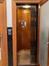 Avenue Molière 48. Ascenseur au rez-de-chaussée, intérieur de la cabine © Copropriété Molière 48, 2022