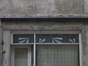 Rue de Parme 11, devanture à imposte garnie de vitraux Art Déco, 2004